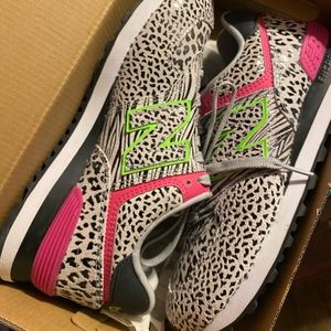 Like new, New Balance 574 animal prints